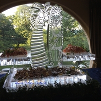 Thumb_palm_tree_and_surf_board_cape_cod_seafood_display_ice_sculpture_for_joelle___brett_at_the_magnificent_drake_hotel