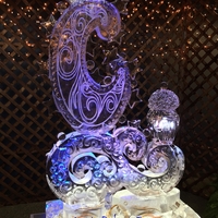 Thumb_moon_whimsical_design_with_swirl__stars_and_a_lamp_ice_sculpture